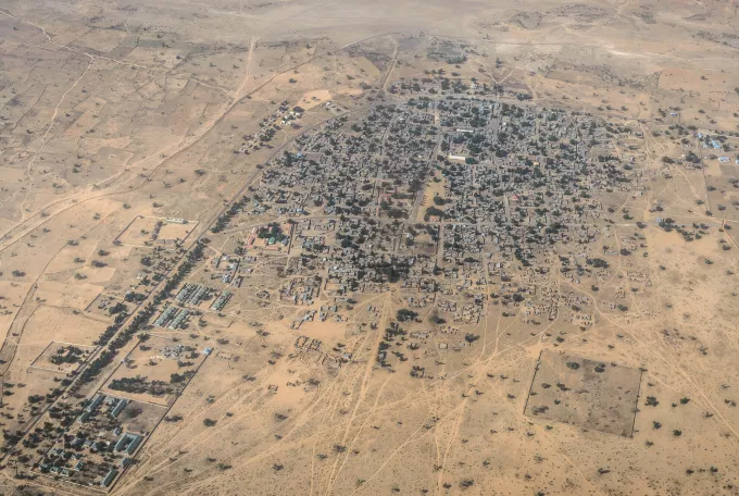 Birdseye view of a village in the desert 